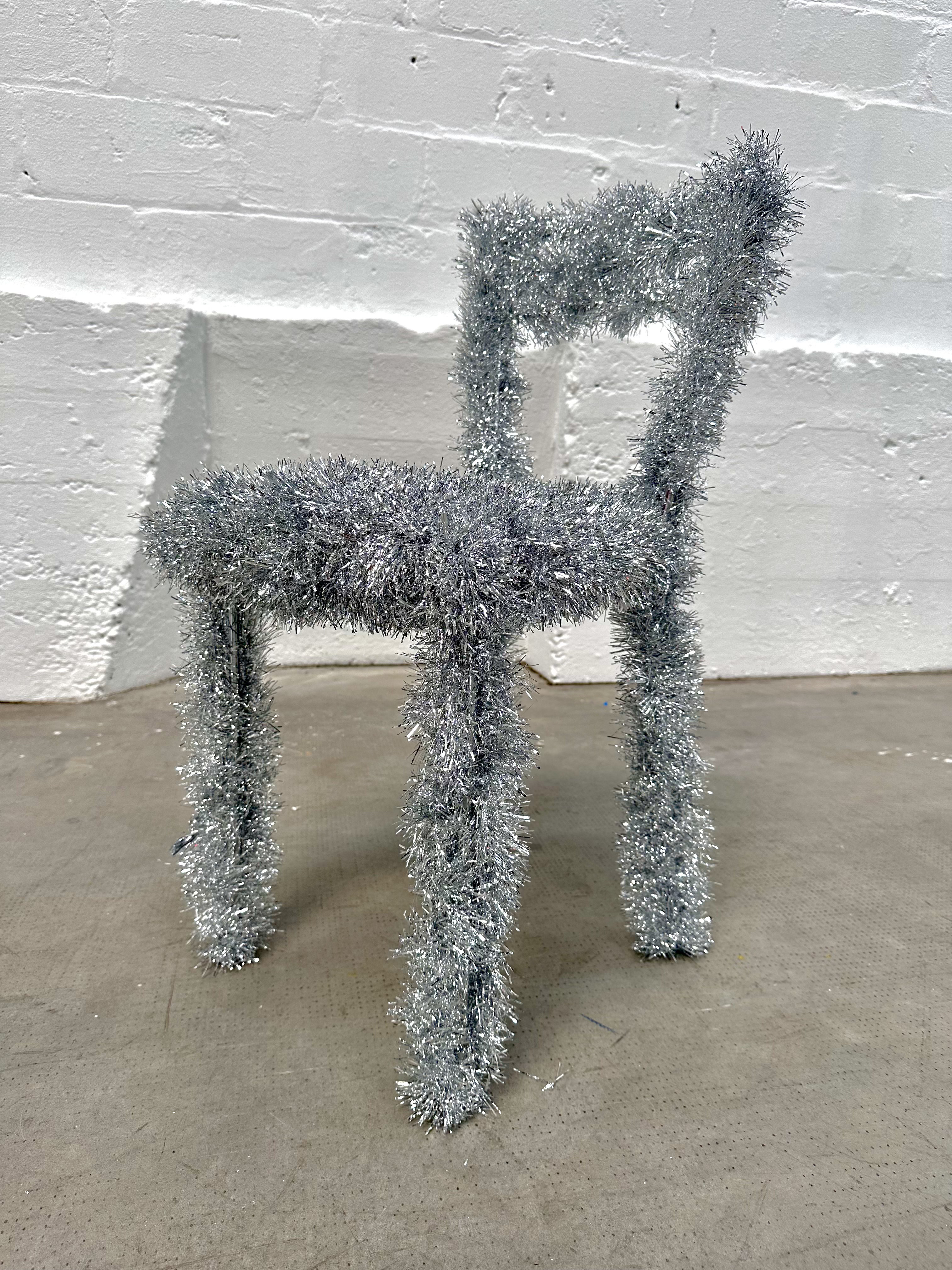 Tinsel-wrapped chair installation